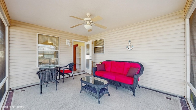 sunroom / solarium with ceiling fan