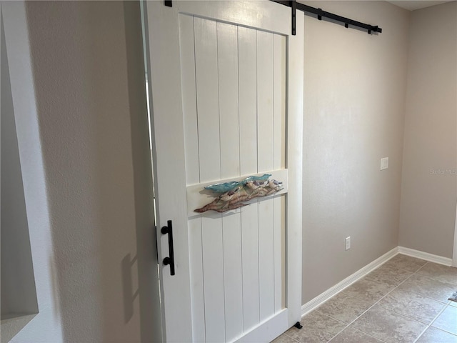 interior details featuring a barn door