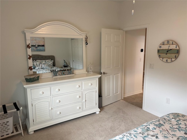 bedroom with light carpet