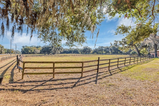 view of gate featuring a rural view