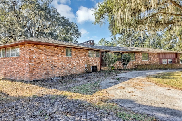 view of home's exterior featuring cooling unit