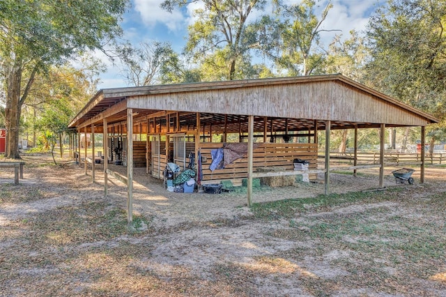 view of property's community with an outbuilding