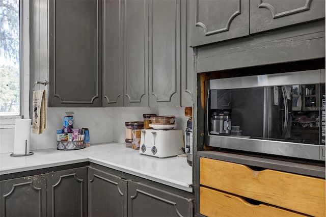 kitchen with gray cabinetry