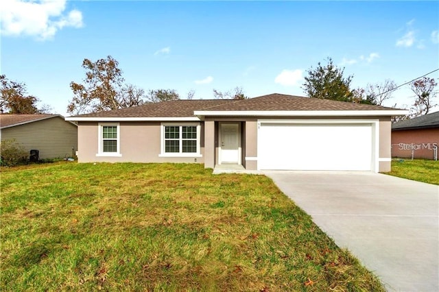 single story home with a front yard and a garage