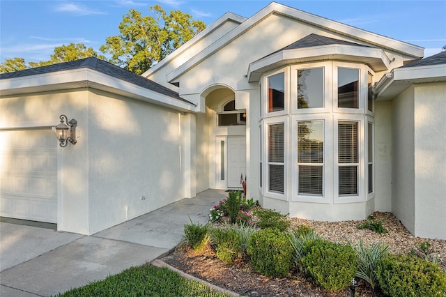 property entrance featuring a garage