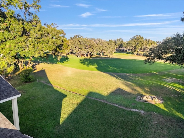 view of community featuring a lawn