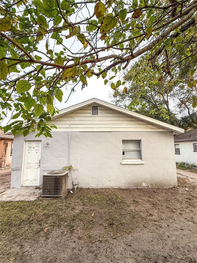 view of home's exterior featuring central AC