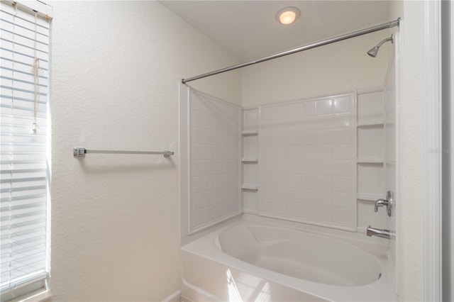 bathroom featuring  shower combination