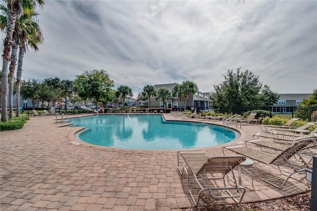 view of pool featuring a patio