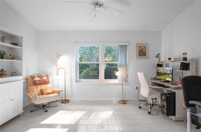 tiled home office with ceiling fan