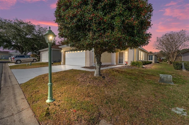 obstructed view of property featuring a lawn