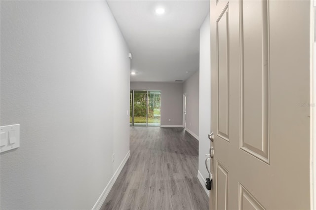 corridor featuring light wood-type flooring