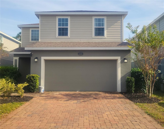 view of front property with a garage