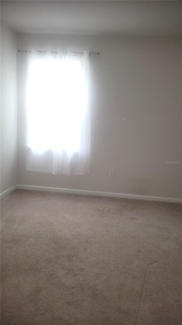 view of carpeted empty room