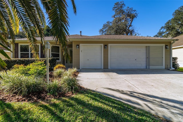 single story home with a garage