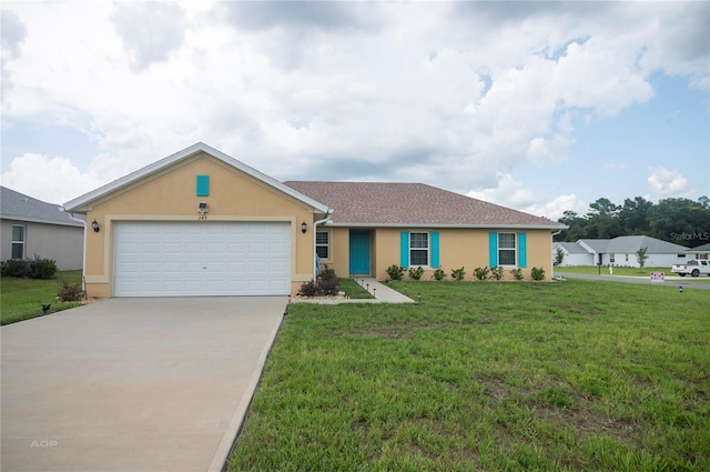 ranch-style house featuring a front yard and a garage