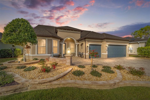 view of front of property with a garage