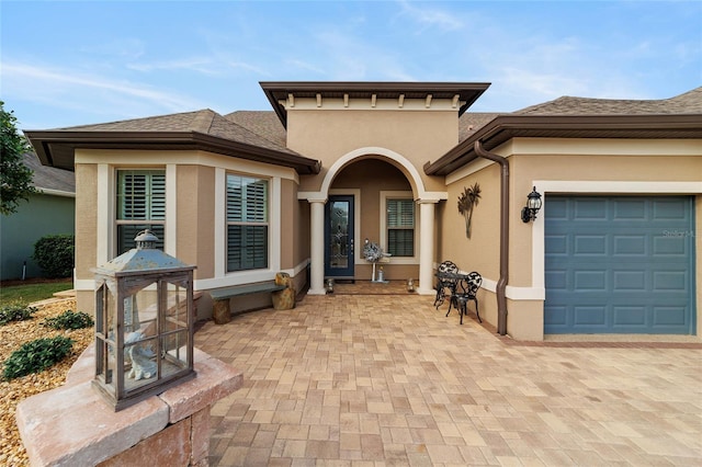 view of front of property with a garage