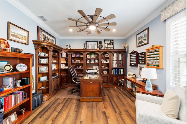 home office with dark hardwood / wood-style floors, ceiling fan, and ornamental molding