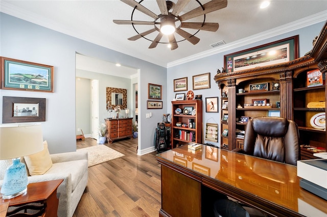 office area featuring hardwood / wood-style flooring, ceiling fan, and crown molding