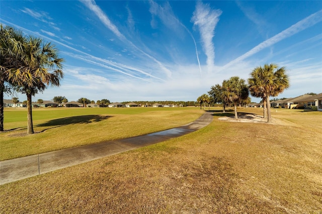 surrounding community featuring a yard