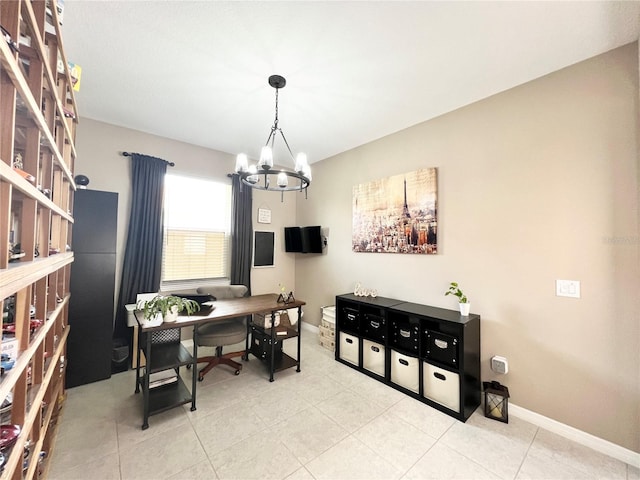 tiled home office featuring a chandelier