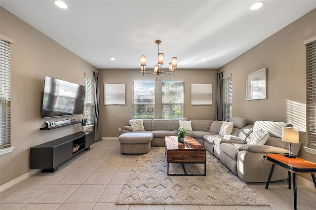 living room with light tile patterned flooring and a chandelier