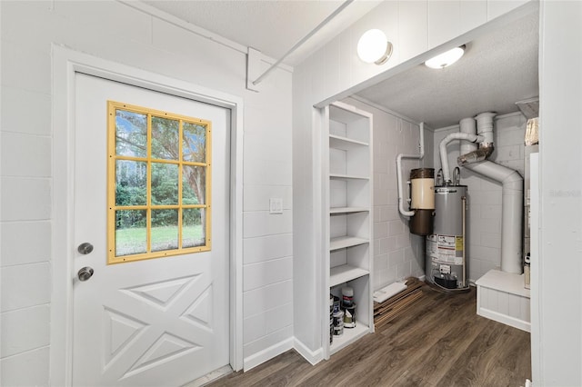 utility room featuring gas water heater