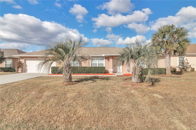 single story home with a garage and a front lawn