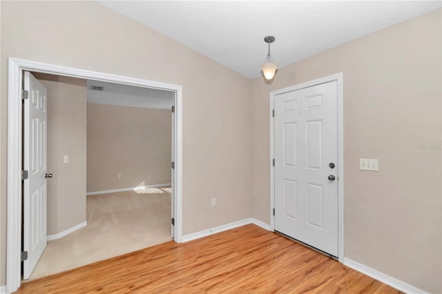 foyer featuring light wood-type flooring