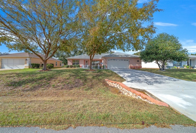 ranch-style home with a front yard and a garage