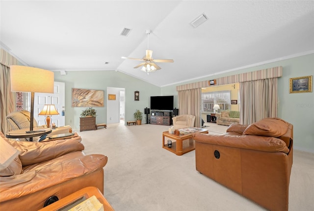 carpeted living room with ceiling fan and lofted ceiling