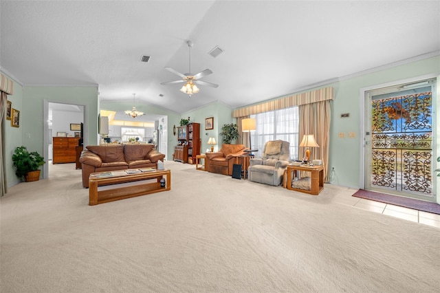 living room with light carpet, ceiling fan with notable chandelier, lofted ceiling, and ornamental molding