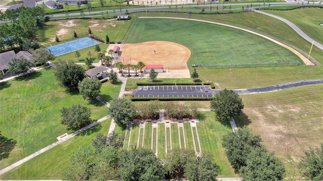 birds eye view of property featuring a rural view