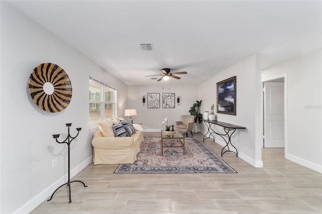 living room featuring ceiling fan