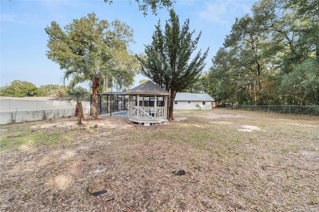 view of yard featuring a sunroom