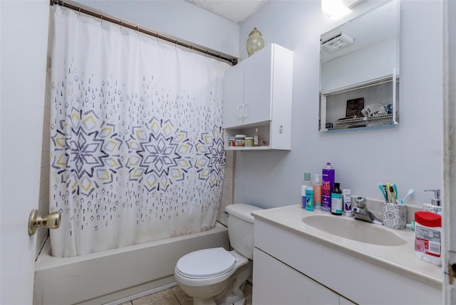 full bathroom featuring shower / bath combo, vanity, tile patterned flooring, toilet, and a textured ceiling