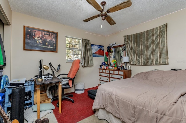 carpeted bedroom featuring a textured ceiling and ceiling fan