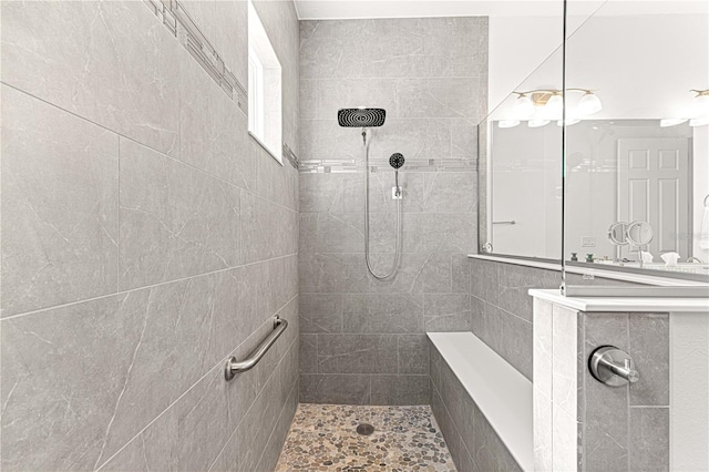 bathroom featuring tiled shower