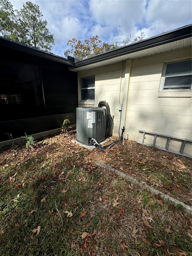 view of home's exterior featuring central AC unit