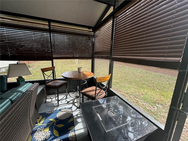 sunroom with lofted ceiling