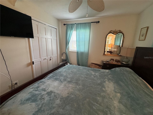 bedroom with a closet and ceiling fan