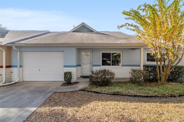 ranch-style home with a garage