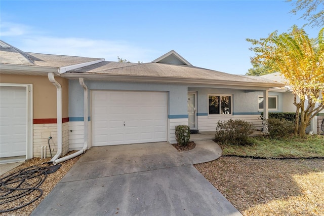 ranch-style home with a garage