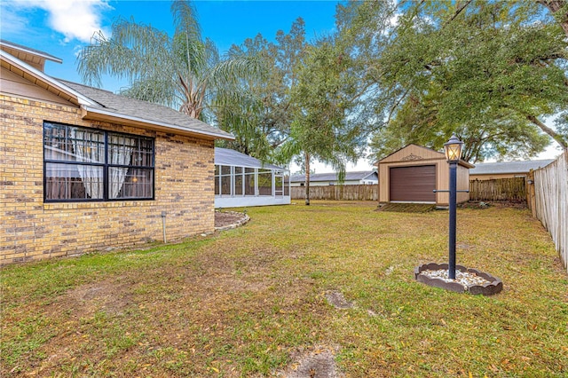 view of yard with a storage unit