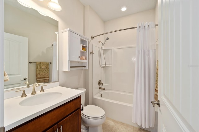 full bathroom featuring tile patterned flooring, shower / tub combo, vanity, and toilet