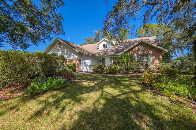 view of front of home with a front yard