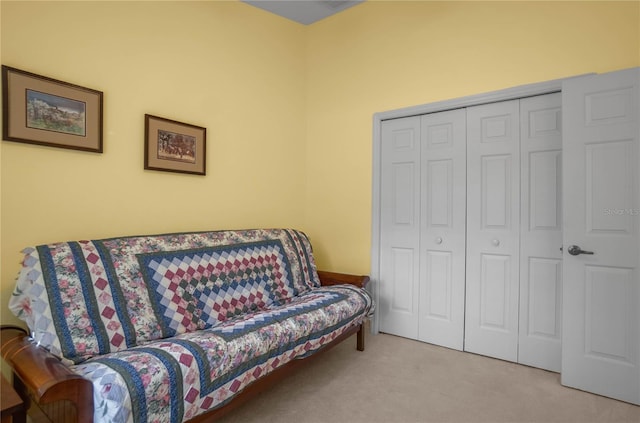 living area with light colored carpet