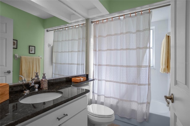 full bathroom featuring vanity, shower / bathtub combination with curtain, and toilet