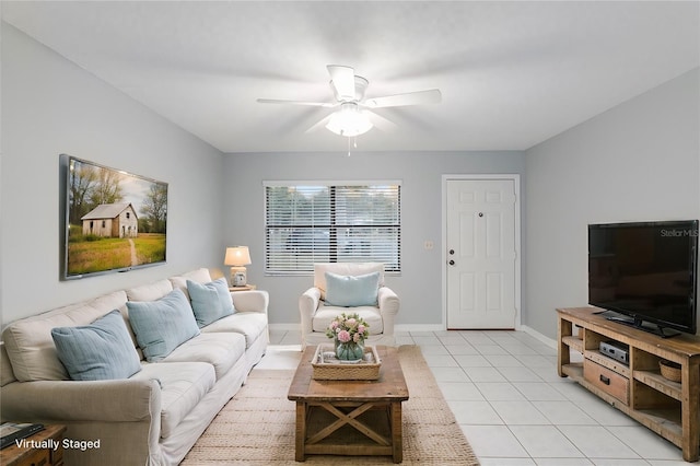 tiled living room featuring ceiling fan